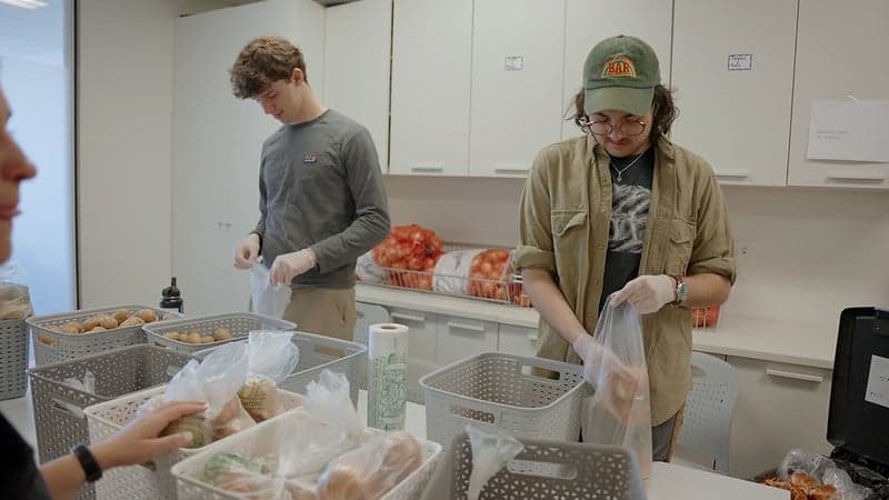 Corps Members packing food at a food pantry